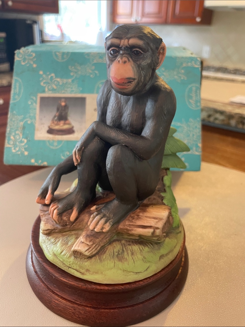 Andrea By Sadek Black and Brown Chimpanzee Figurine on Round Wood Base